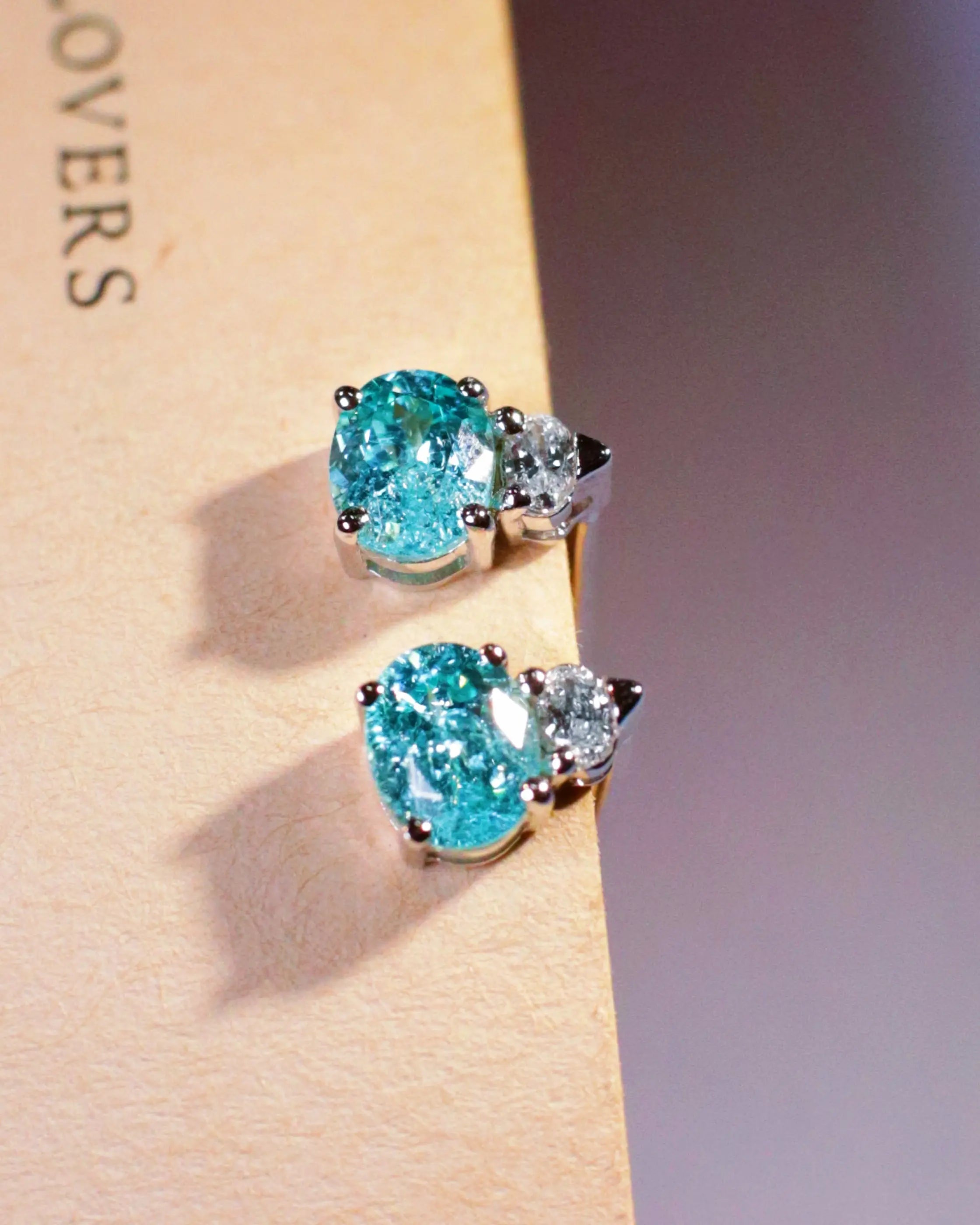 OEM/ODM/Wholesale Oval-Cut Lab-Grown Paraiba Tourmaline Stud Earrings in 9K White Gold | 1.18ct + 0.062ct | 1.5g | Elegant Glow