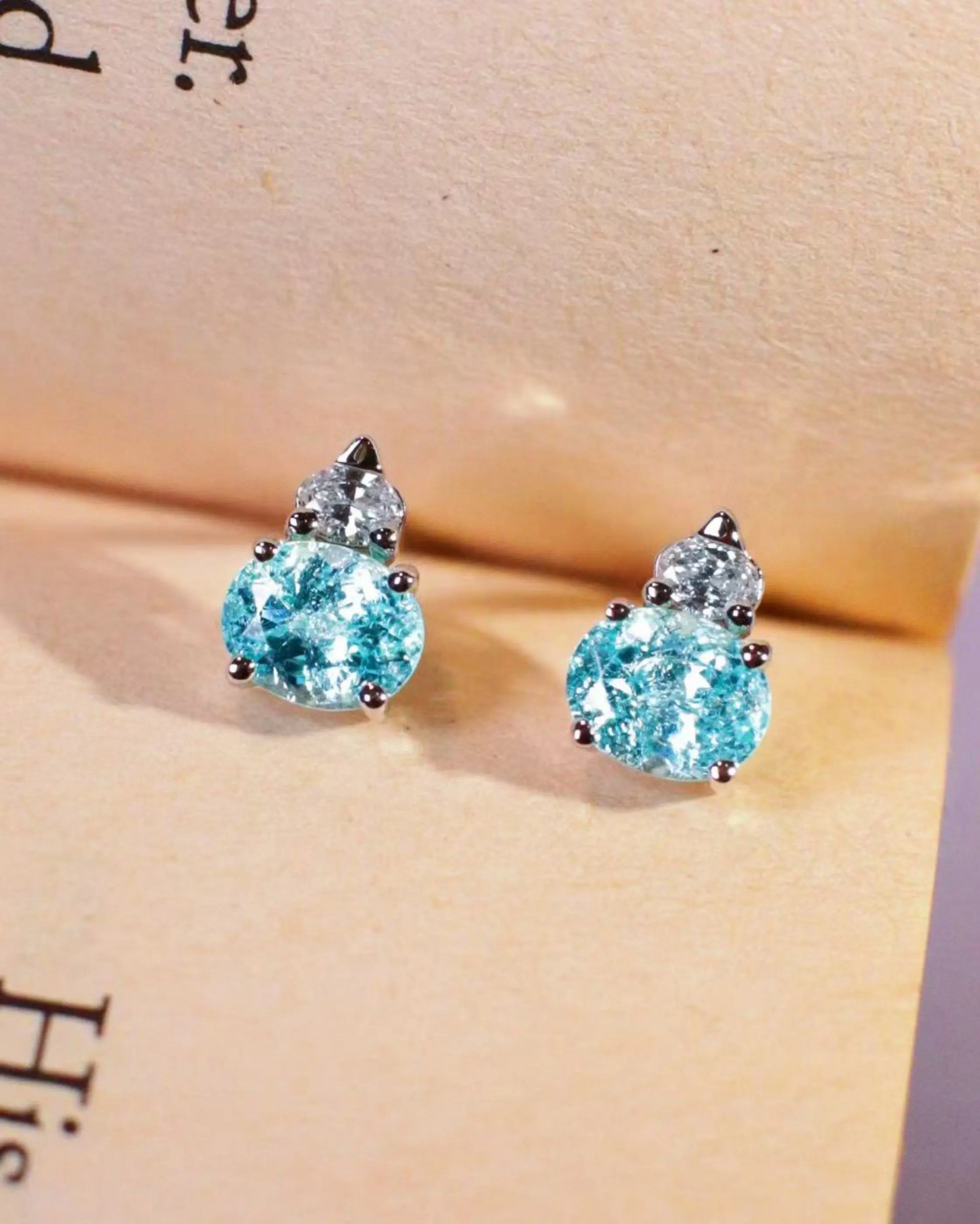 OEM/ODM/Wholesale Oval-Cut Lab-Grown Paraiba Tourmaline Stud Earrings in 9K White Gold | 1.18ct + 0.062ct | 1.5g | Elegant Glow
