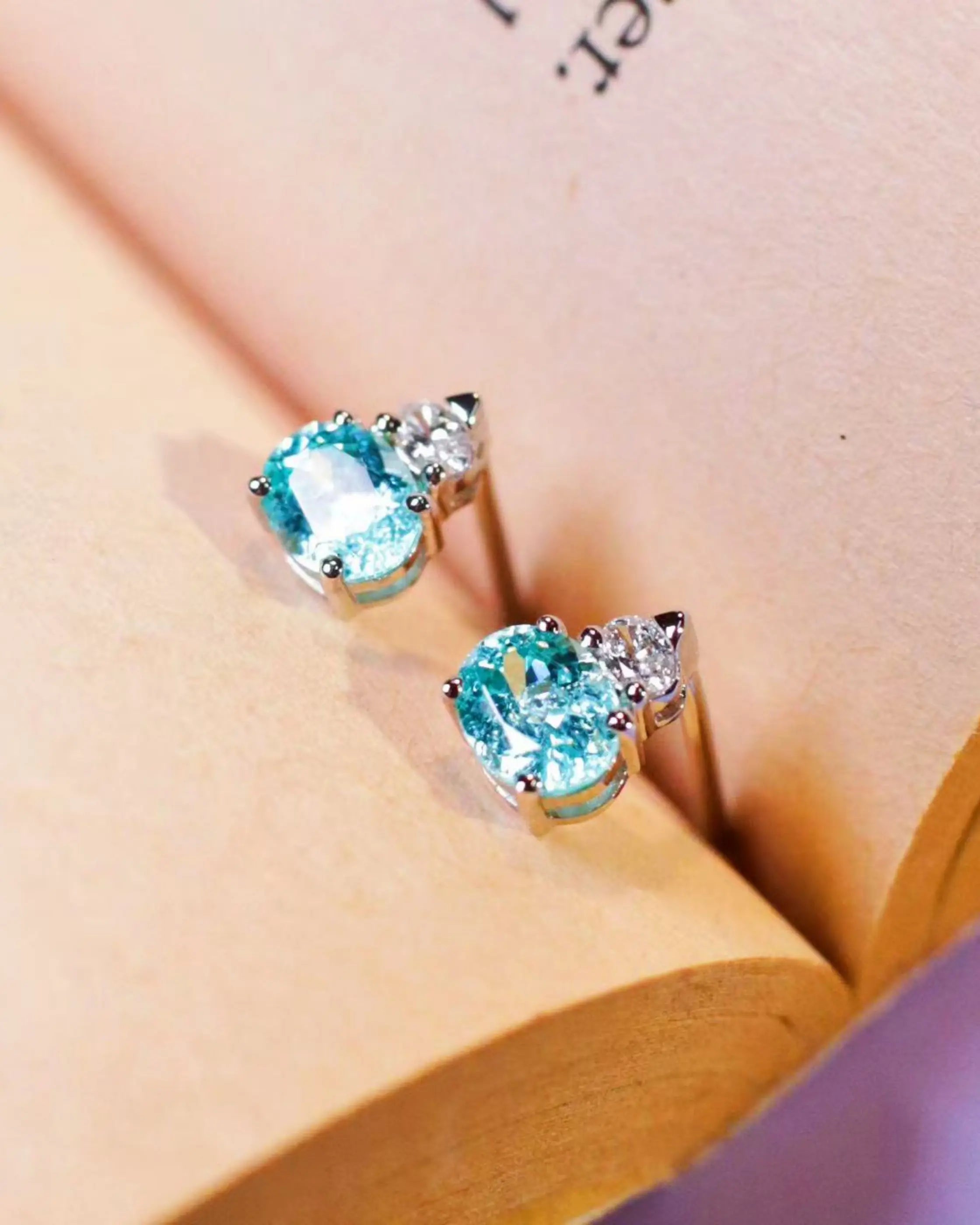 OEM/ODM/Wholesale Oval-Cut Lab-Grown Paraiba Tourmaline Stud Earrings in 9K White Gold | 1.18ct + 0.062ct | 1.5g | Elegant Glow