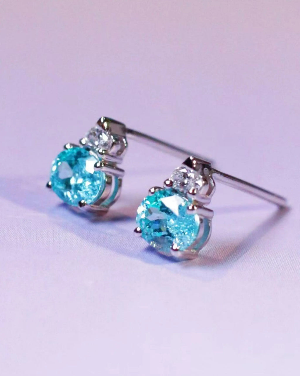 OEM/ODM/Wholesale Oval-Cut Lab-Grown Paraiba Tourmaline Stud Earrings in 9K White Gold | 1.18ct + 0.062ct | 1.5g | Elegant Glow