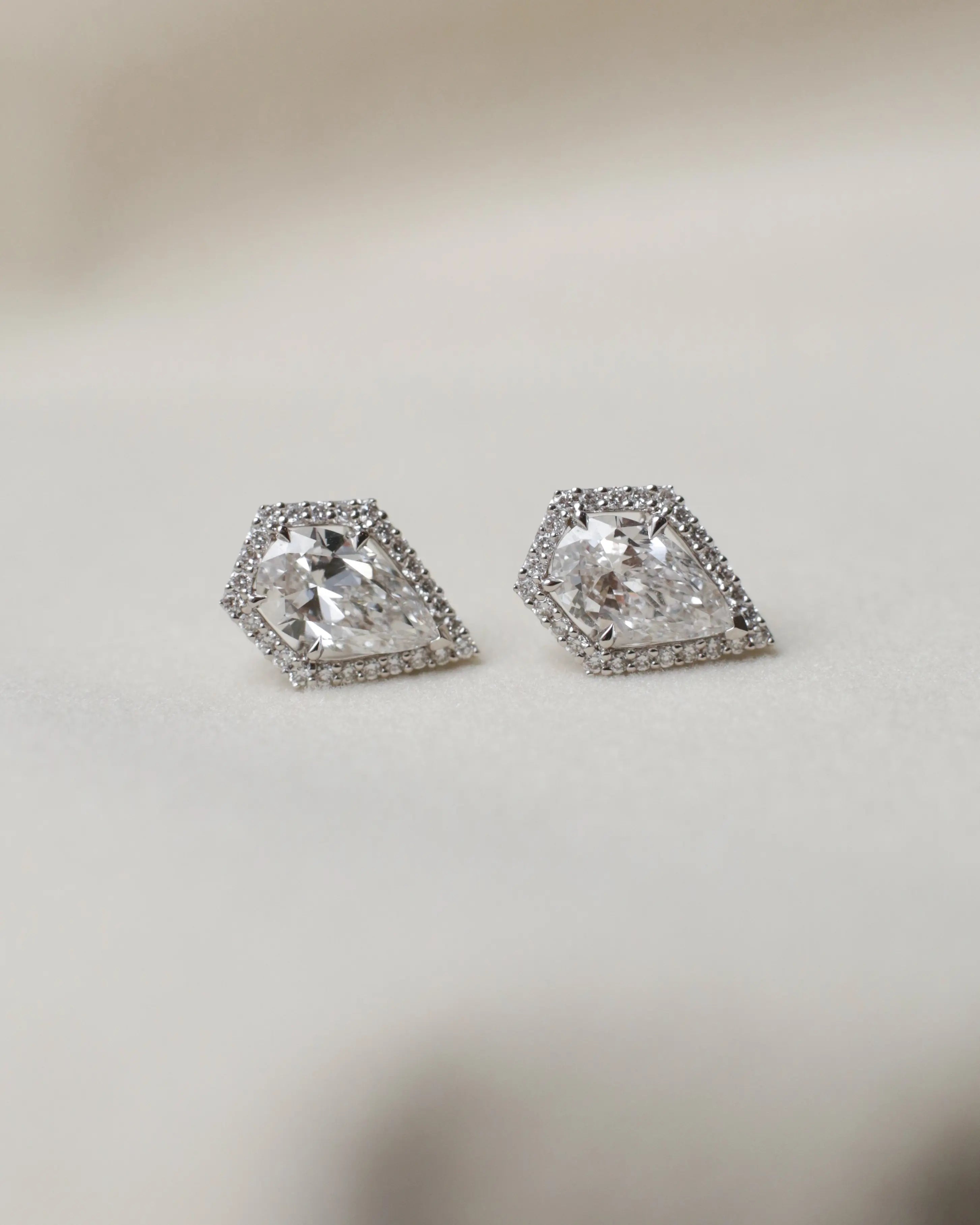 OEM/ODM/Wholesale Lab-Grown Diamond Stud Earrings in 18K White Gold | 2.03ct Pear Cut with 0.294ct Halo | Modern Halo Setting
